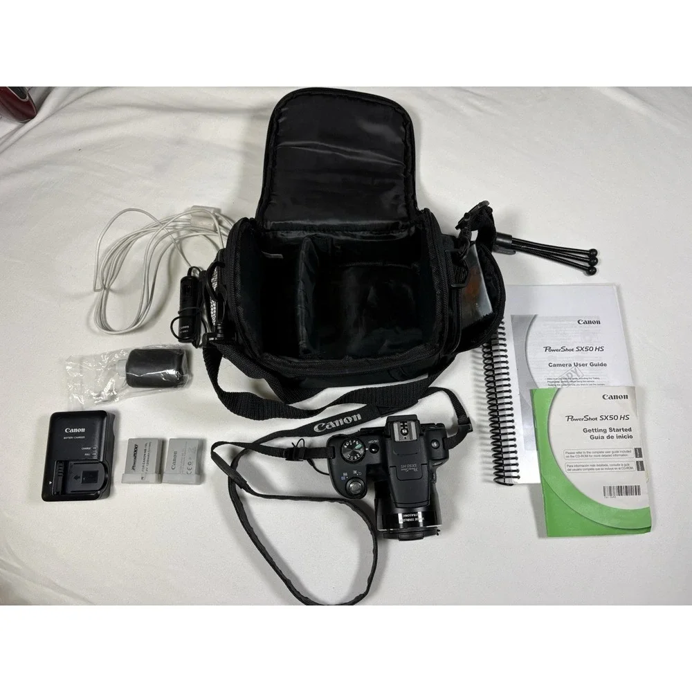 Canon PowerShot SX50 HS 12.1MP Digital Camera Bundle Bag 2-Batteries 32GB SD Kit